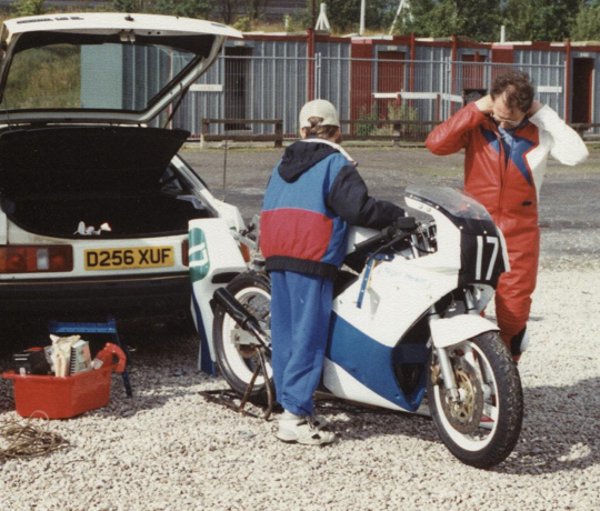 Adrian, age 13, prepping the race bike